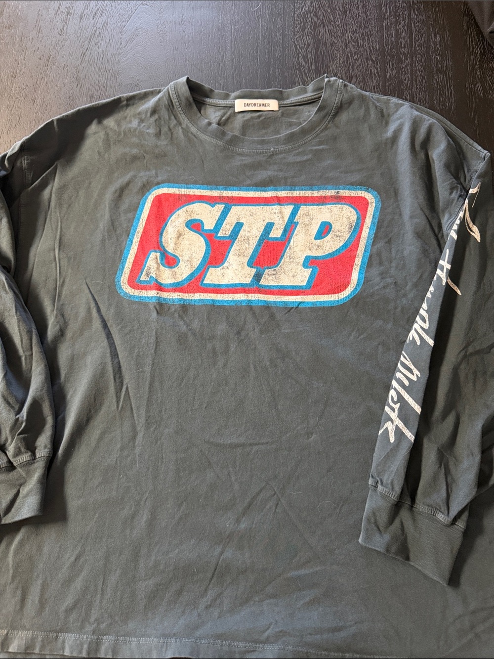 Daydreamer Black Long Sleeve Tee with Red & Blue STP Logo